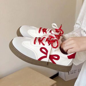 Coquette White Low-Top Sneakers with Red Bow Details